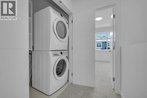 Photos may be of a similar home in the community - 5300 Main Street Unit# 121, Kelowna, BC - Indoor Photo Showing Laundry Room