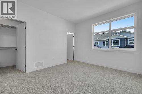 Photos may be of a similar home in the community - 5300 Main Street Unit# 121, Kelowna, BC - Indoor Photo Showing Other Room