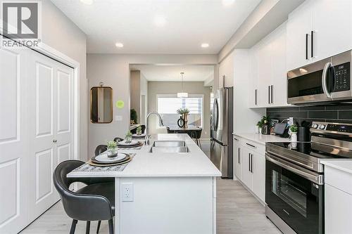 226 Heartwood Parade Se, Calgary, AB - Indoor Photo Showing Kitchen With Upgraded Kitchen