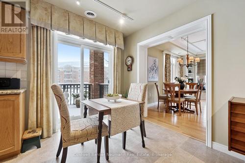 Breakfast for Two Enjoying the Morning Sun - 202 - 65 Bayberry Drive, Guelph (Village By The Arboretum), ON - Indoor Photo Showing Dining Room