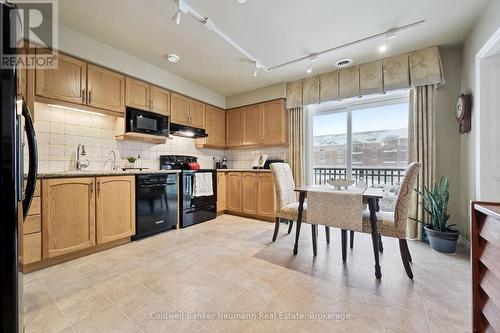Dream of Summer Breakfasts on your Kitchen Balcony - 202 - 65 Bayberry Drive, Guelph (Village By The Arboretum), ON - Indoor Photo Showing Other Room