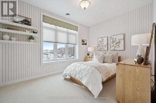 Serene Guestroom with Abundant Natural Light - 202 - 65 Bayberry Drive, Guelph (Village By The Arboretum), ON - Indoor Photo Showing Bedroom