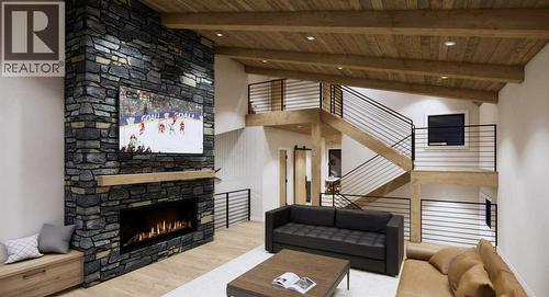 219B Three Sisters Drive, Canmore, AB - Indoor Photo Showing Living Room With Fireplace