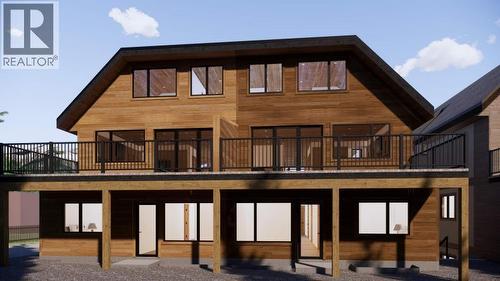 219B Three Sisters Drive, Canmore, AB - Outdoor With Exterior