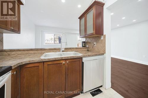 116 - 1538 Lancaster Drive, Oakville, ON - Indoor Photo Showing Kitchen With Double Sink