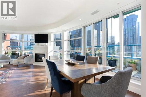 1005, 205 Riverfront Avenue Sw, Calgary, AB - Indoor With Fireplace