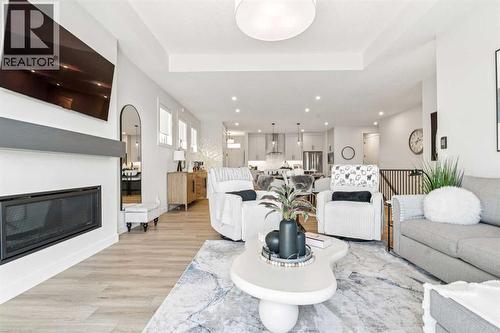 155 Sage Meadows View Nw, Calgary, AB - Indoor Photo Showing Living Room With Fireplace