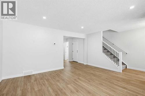 5610 Pensacola Crescent Se, Calgary, AB - Indoor Photo Showing Other Room