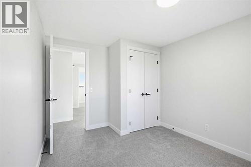 5610 Pensacola Crescent Se, Calgary, AB - Indoor Photo Showing Other Room