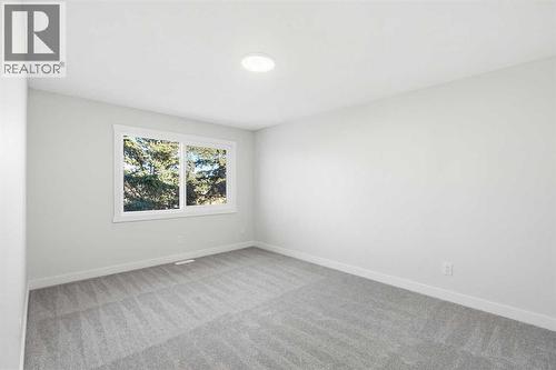 5610 Pensacola Crescent Se, Calgary, AB - Indoor Photo Showing Other Room