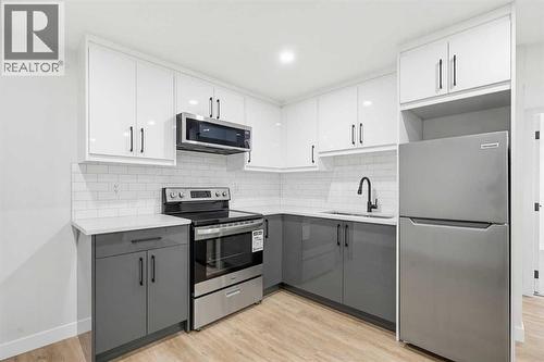 5610 Pensacola Crescent Se, Calgary, AB - Indoor Photo Showing Kitchen With Stainless Steel Kitchen With Upgraded Kitchen