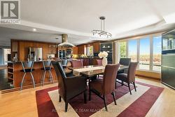 Dining Room overlooks yard, and kitchen. - 