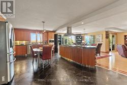 Solid wood cabinetry and easy care tile. - 