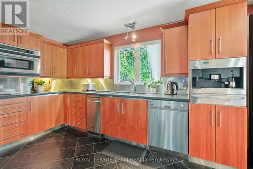 Custom built in stainless appliances. - 461 Campbells Side Road, Beckwith, ON - Indoor Photo Showing Kitchen