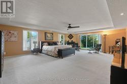 Large primary bedroom with walk in closets & FPL. - 