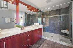 Ensuite bath with dual sinks & custom shower. - 
