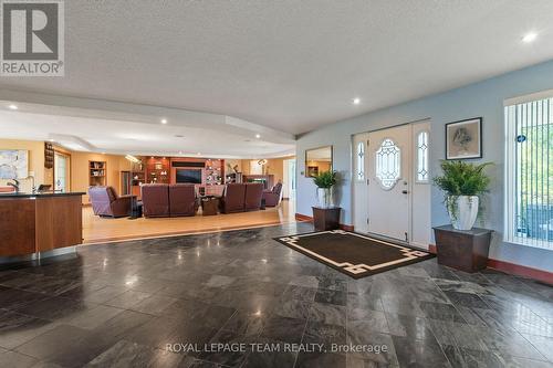 Large tile foyer welcomes you upon entry. - 461 Campbells Side Road, Beckwith, ON - Indoor Photo Showing Other Room
