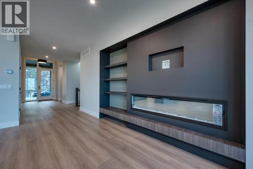 1030 Emslie Street, Kelowna, BC - Indoor With Fireplace