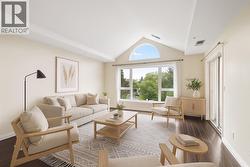 Top floor, vaulted ceilings on the quiet side. Photo is virtually staged. - 