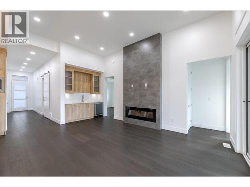 5586 Nixon Road, Summerland, BC - Indoor Photo Showing Living Room With Fireplace