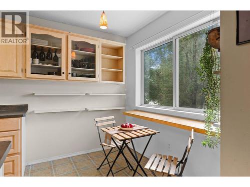 Breakfast bar with forest views - 4404 Pleasant Valley Road Unit# 6, Vernon, BC - Indoor Photo Showing Other Room