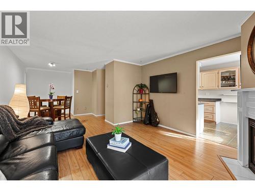 Functional design - 4404 Pleasant Valley Road Unit# 6, Vernon, BC - Indoor Photo Showing Living Room With Fireplace