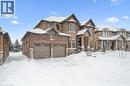 View of front of house featuring an attached garage and brick siding - 263 Chestnut Ridge, Waterloo, ON  - Outdoor With Facade 