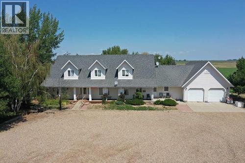 161078 Twp  132 Road, Vauxhall, AB - Outdoor With Deck Patio Veranda With Facade