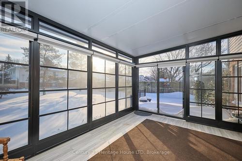 3 season sunroom with electric blinds - 3722 Sussex Lane, Fort Erie (Black Creek), ON - Indoor Photo Showing Other Room