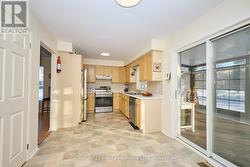 Spacious eat-in kitchen with stainless appliances - 