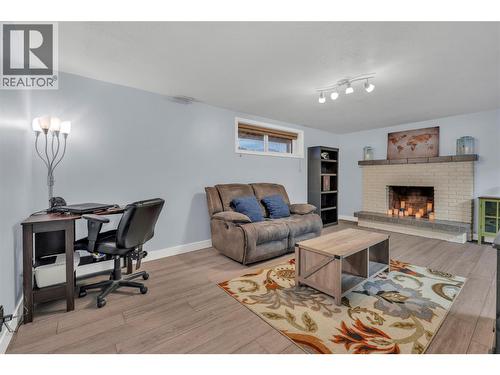 110 Hastings Place, Penticton, BC - Indoor Photo Showing Living Room With Fireplace