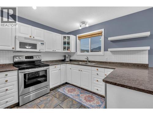 110 Hastings Place, Penticton, BC - Indoor Photo Showing Kitchen With Double Sink