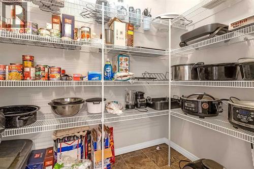 207, 1010 Railway Street, Crossfield, AB - Indoor With Storage