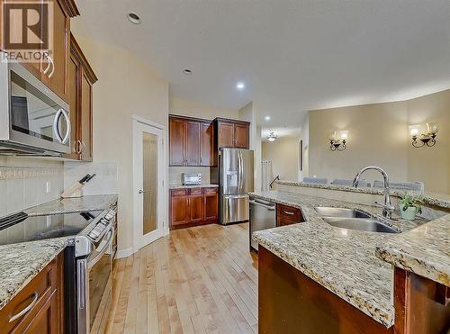 308 Lineham Acres Drive Nw, High River, AB - Indoor Photo Showing Kitchen With Double Sink With Upgraded Kitchen