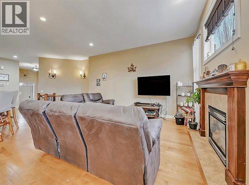 308 Lineham Acres Drive Nw, High River, AB - Indoor With Fireplace