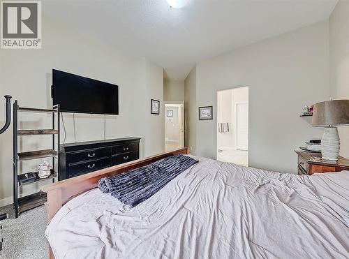 308 Lineham Acres Drive Nw, High River, AB - Indoor Photo Showing Bedroom