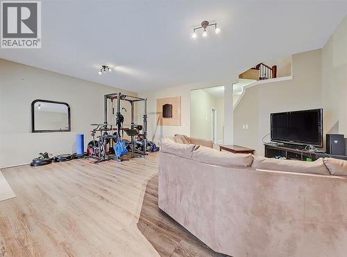 308 Lineham Acres Drive Nw, High River, AB - Indoor Photo Showing Gym Room
