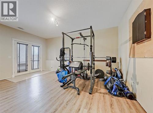 308 Lineham Acres Drive Nw, High River, AB - Indoor Photo Showing Gym Room