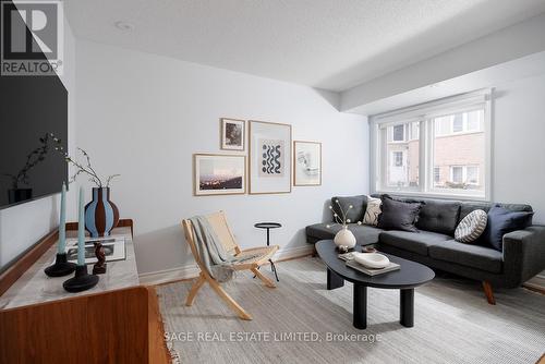 144 - 30 Merchant Lane, Toronto, ON - Indoor Photo Showing Living Room