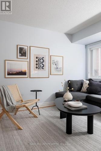 144 - 30 Merchant Lane, Toronto, ON - Indoor Photo Showing Living Room