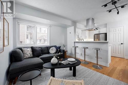 144 - 30 Merchant Lane, Toronto, ON - Indoor Photo Showing Living Room