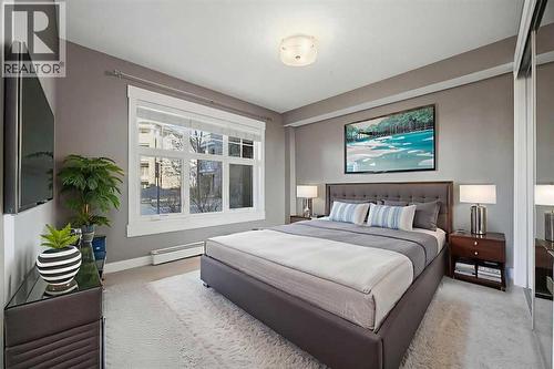 Primary room virtually staged - 2118, 11 Mahogany Row Se, Calgary, AB - Indoor Photo Showing Bedroom