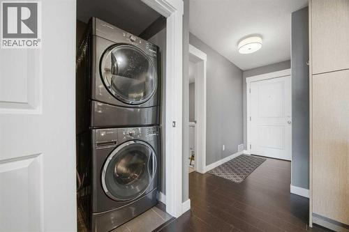 in suite laundry - 2118, 11 Mahogany Row Se, Calgary, AB - Indoor Photo Showing Laundry Room