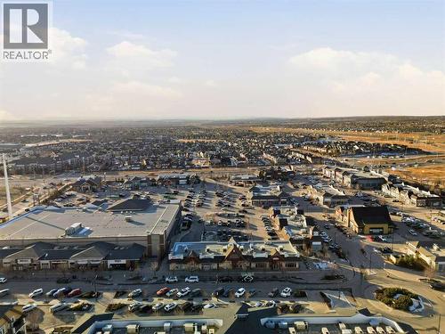 Walking distance to grocery stores, shops and restaurants - 2118, 11 Mahogany Row Se, Calgary, AB - Outdoor With View