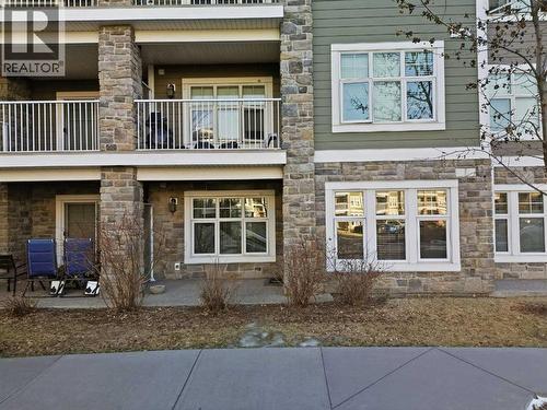 Apartment access from parking stlal - 2118, 11 Mahogany Row Se, Calgary, AB - Outdoor With Facade