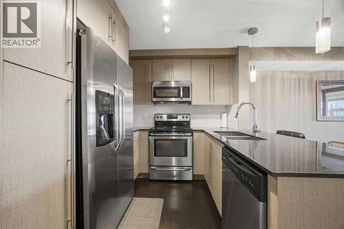 Kitchen - 2118, 11 Mahogany Row Se, Calgary, AB - Indoor Photo Showing Kitchen With Upgraded Kitchen