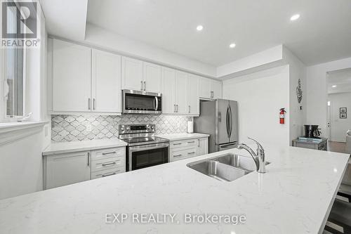 22 18Th Street N, Wasaga Beach, ON - Indoor Photo Showing Kitchen With Double Sink With Upgraded Kitchen
