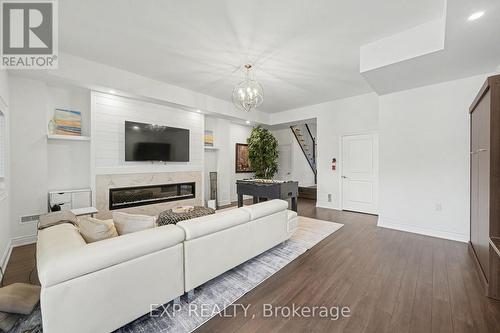 22 18Th Street N, Wasaga Beach, ON - Indoor Photo Showing Living Room With Fireplace