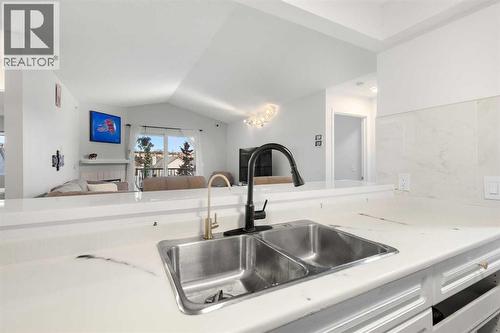 510, 55 Arbour Grove Close Nw, Calgary, AB - Indoor Photo Showing Kitchen With Double Sink