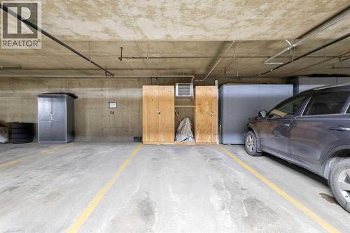 510, 55 Arbour Grove Close Nw, Calgary, AB - Indoor Photo Showing Garage